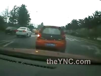 Derranged Lady Jumps off a Bridge in China into oncoming Highway Traffic....DAMN