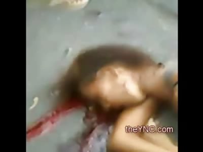 Cell Phone Video of Woman Biker in Awkward Position in Street after Fatal Trauma