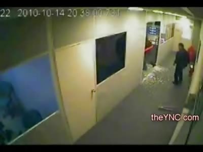 Idiot Waks right throough a Glass Door