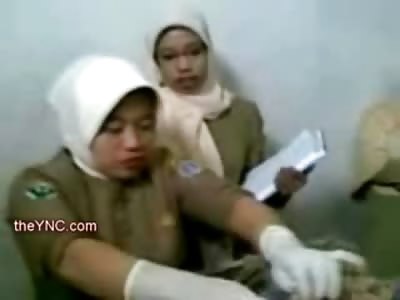 Biarre Video showsWomen Playing  with Man's Guts on the Morgue Table after his Death 