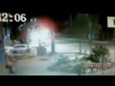 Small Speeding Car, takes out a Giant 18 Wheeler and sends it into a Building