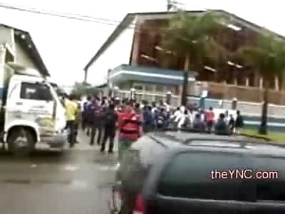 Protestor paying NO Attention Crossing the Street nearly Pays with his Life