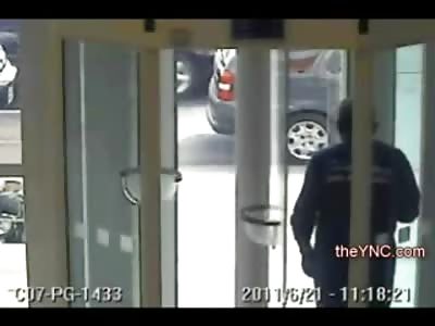 Man nonchalantly Executed Godfather Style in Revolving Glass Door