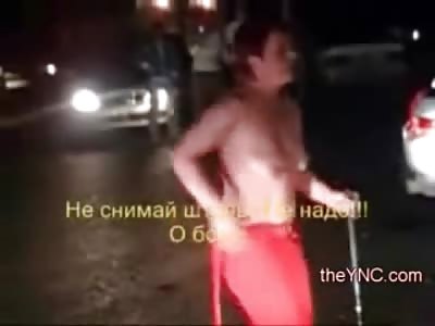 Drunken Redhead with a Big Ass puts on a Slow Strip Tease out in Public