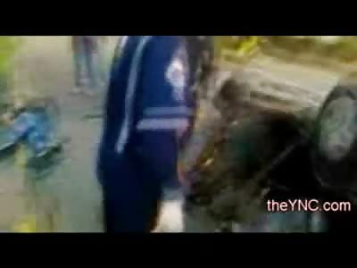 Groaning Man still Alive has his Minivan on top of his Torso