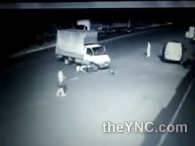 Motorcycle Rider Head on Love Fest with Turning Truck