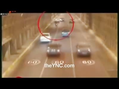 Motorcyclist in a Tunnel Falls off his Bike and then Run Over by Cars