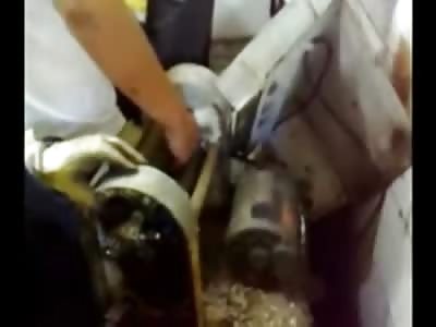 Man Screaming like a Bitch with his Hand caught in a Press