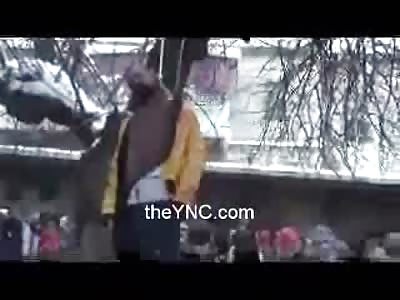 Soldiers in Syria make Statement to Camera as Victim Dangles from Tree