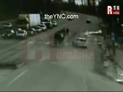 Swerving Driver  takes out entire Crowd of Pedestrians waiting to Cross the Street