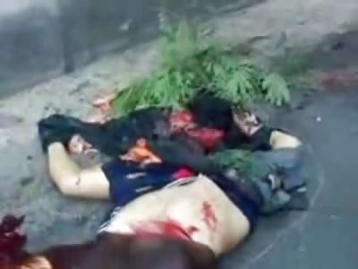 Man Ripped apart with Organs Hanging out is Loaded into a Wheelbarrow