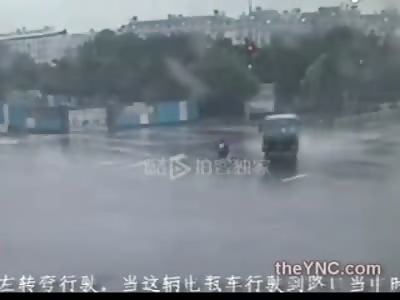 Motorcycle Rider Crushed by Sliding Truck