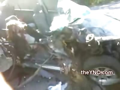 Pretty Woman in Passenger Seat Dead but Still Strapped in Seat...Others Not So Lucky