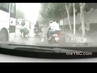 LMFAO: Girl Lifted off Her Scooter by Cable Line