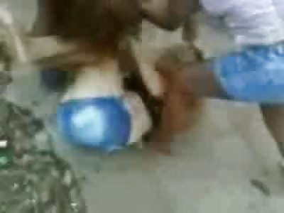 Crazy Latino Women Fight on the Dirty Sdewalk both Slip out of their Shirts at End of Fight