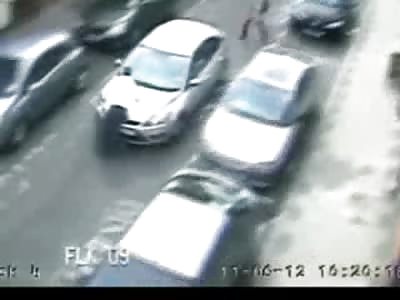 Deranged Woman Hits and Drags Man Down Street