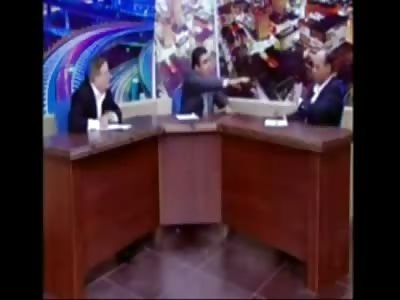 HEATED: Politician Pulls Gun on Rival During Live TV Debate