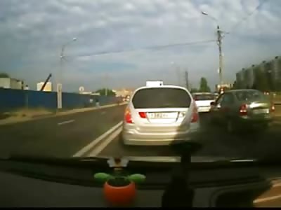 Man on Bicycle is Struck by Car