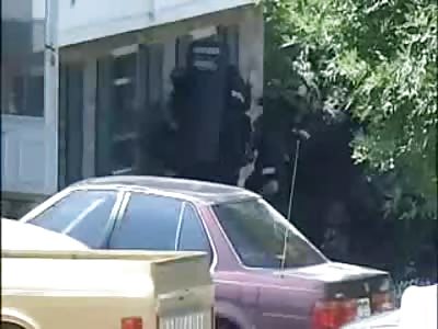 Fat Man throws Robot, shrugs off Tasers, Stun Guns, and Tear Gas from SWAT Team lol 