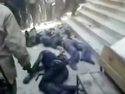 Postal Workers thrown from Rooftop like bags of Trash in Front of Gathering Crowd