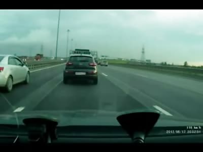 Man on a Motorcycle doesn't see Driver Break in Front of Him..