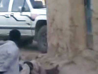 Man Bound at the Hands is Executed with his Back Turned to the Crowd