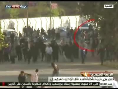 Demonstrator in Black Tank Top throws a Rock at an Angry mob, Demonstrator is Shot Dead (Watch Slow Motion)