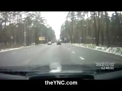 STREET FOOTBALL: Kid Tries Shoulder Blocking on Coming Car or Maybe he Just Tripped..lol