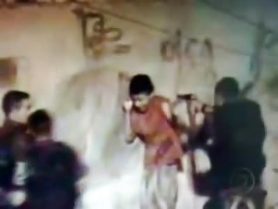 Police Shoot Innocent non Threatening Kid Point Blank after Beating Him