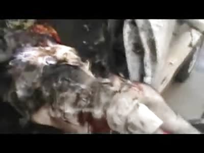 Blood and Guts Body Plops out of Car without his Head