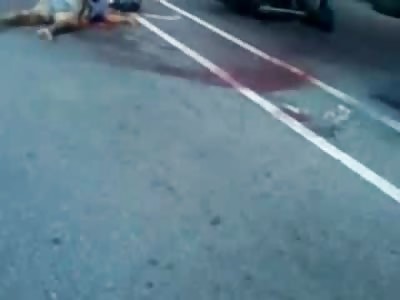 Cyclist Splattered on Road....OUCH!!