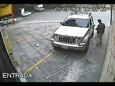 This is what Happens when a Car Jacker tries it with a Man carrying a Gun