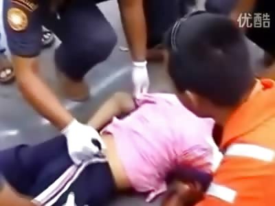 WET T-SHIRT OF BLOOD: Woman's Pink T-Shirt Now See Through because of All the Blood