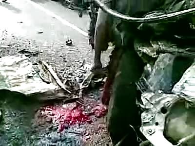 Man Tries but Fails Several Times to Get up and Walk away after Horrible Accident.....Other Person Splattered All over the Road