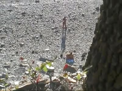 Mature Couple Fuck on the Rocks at a Public Beach in front of Everyone