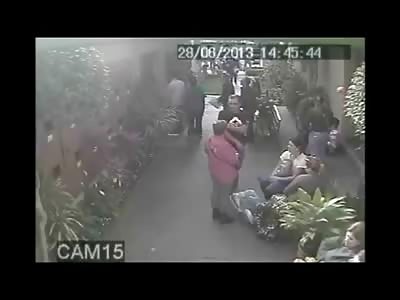 Man chased into the Store is Executed on the Floor..Murderer comes back to Check his Work