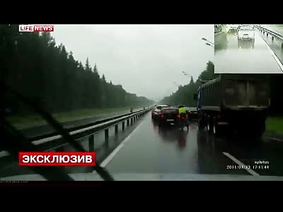 Famous Photographer is Killed Instantly when his Motorcycle Slips under Truck and He's Crushed by the Wheel