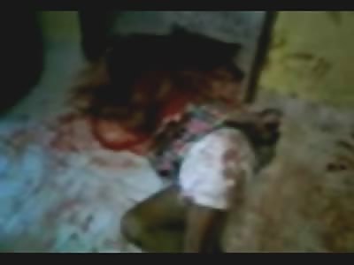 Absolutely Bizarre Video of Couple Squirming in their Own Blood with Message Written in Blood on the Floor