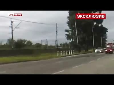 Man Talking with Police Knocked Down by Crane Arm on Truck