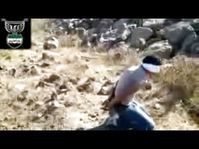 AK47 Execution of Cowering Blindfolded man