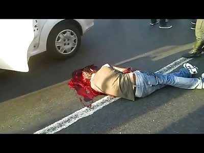 Dying Man making Snow Angels in his Own Blood is just tossed into Police Car