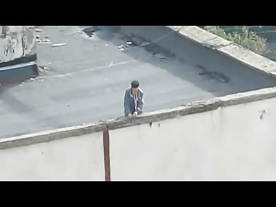 Elderly man ends his Life atop Building, Shooting Himself then Falling to the Street