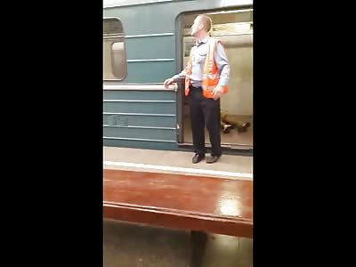 Metro Employee tries Hiding Suicide Boy from the Passer by's on the Subway...