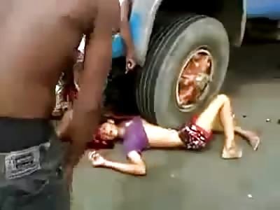 Biker and His Passenger Become one with a Truck