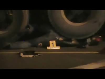 Motorcyclist Flattened under Semi's Wheels