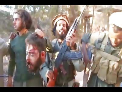 Cheerful Terror Group shows off the Head of Iranian Offficer