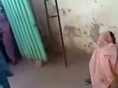 Crying Muslim Woman in Hijab being Whipped for some Stupid Reason