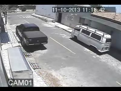 Boy runs into the Street is Hit by Black Pickup Truck