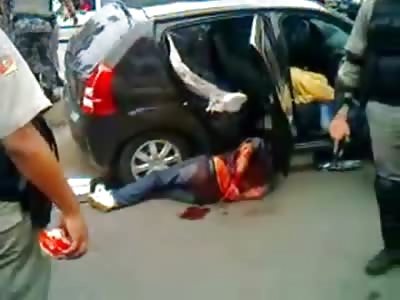 Man pulled from Car is left there to Bleed out..