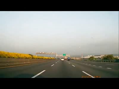 Terrifying Crash crushes Car after Trucks Tire Explodes Sending him into his Lane